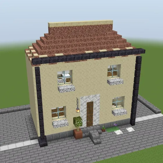 Minecraft build of the yellow townhouse with a red-brown tiled roof, framed windows and flower boxes
